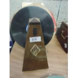 A Wittner metronome and a selection of 78 records