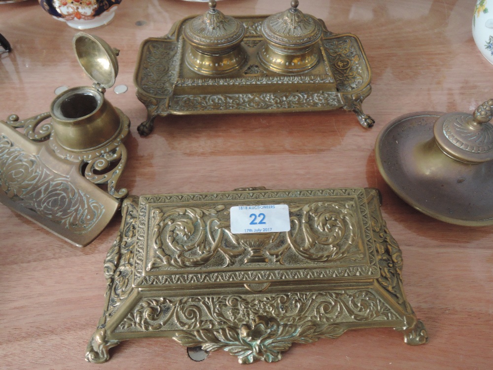 Three brass ink wells and desk tidies and a brass stamp box