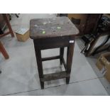A traditional stained lab stool