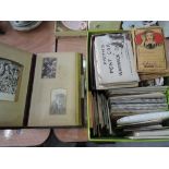 A box of vintage British and European photographs, postcards and a leather bound photgraph album