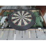 A vintage table soccer game and dartboard