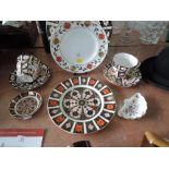 A collection of Royal Crown Derby Old Imari pattern plates, cups and saucers (one saucer cracked),
