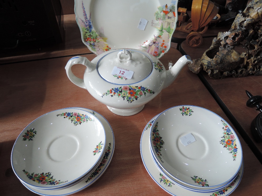 A vintage Meakin sandwich plate and a selection of Empire teaware including teapot