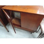 A vintage teak television cabinet