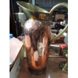 A large Arts and Crafts style copper and brass jug