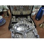 A canteen of cutlery and plated tray