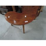 A vintage kidney shaped stained frame occasional table