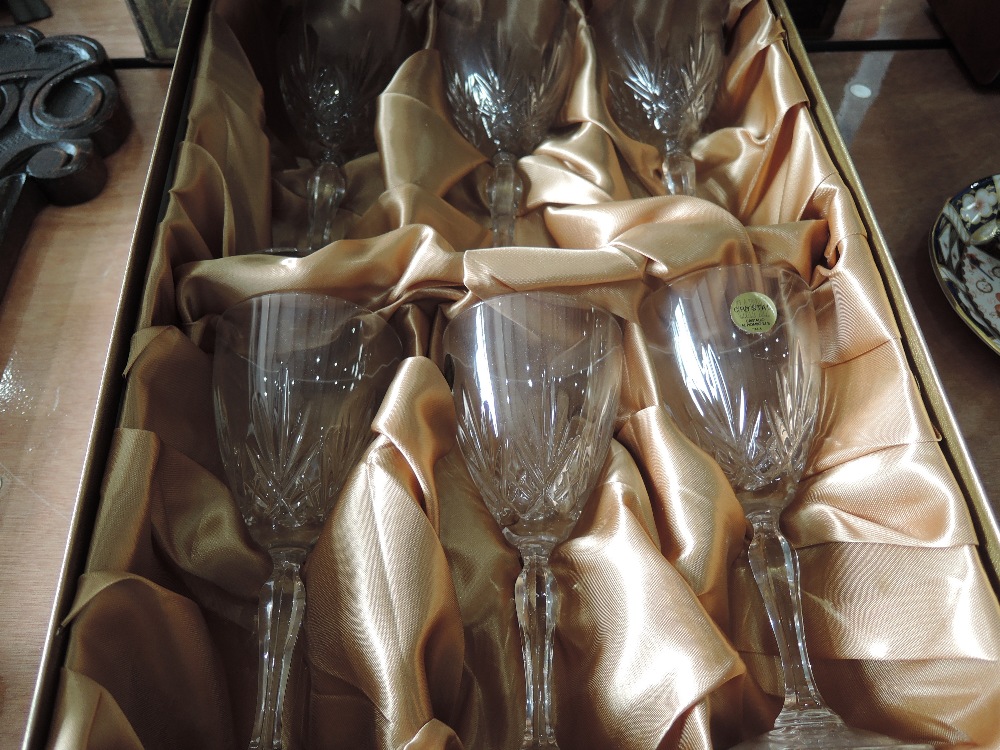 A boxed set of six Capri crystal wine goblets