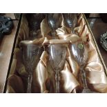 A boxed set of six Capri crystal wine goblets