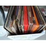 A box of various vinyl LP's various genres