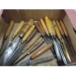 A box of vintage carving chisels