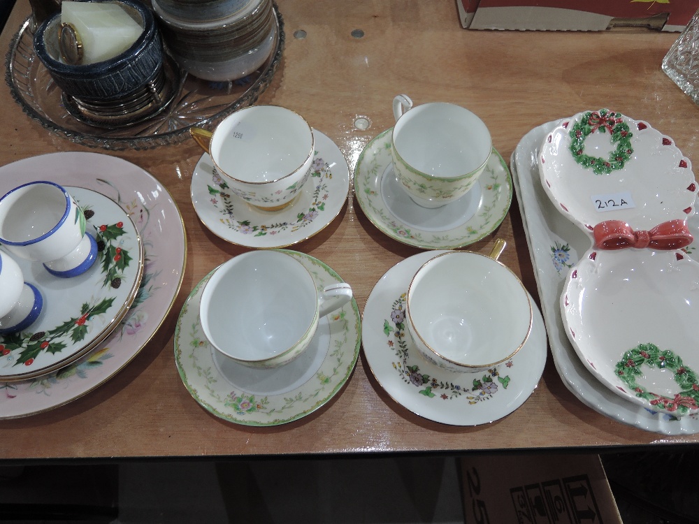 A selection of cups and saucers including Noritake, Royal Grafton christmas plates etc