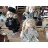 Three ceramic collectors dolls