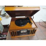 A modern reproudciotn gramophone in wooden case, includes CD and cassette facility