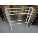 A traditional painted Victorian style towel rail