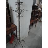 A modern wrought frame coat/hat stand