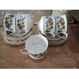 A Sheriden part tea service in white and gilt with fruit design (15 pieces approx)