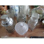 A selection of cut glass decanters, vases and cocktail shaker etc