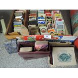 A large selection of vintage playing cards and card games including advertising