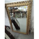 A gilt framed mirror