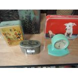 A selection of vintage advertising tins, money box and bakelite thermometer