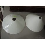 A pair of milk glass shades