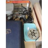 A selection of vintage cane fishing rods, a box of reels including Intrepid Surf Cast, and ABU