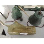 A set of cast bells with animal decoration including brass clog decoration