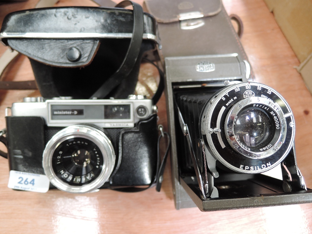 Two vintage cameras, a Ross Ensign Epsilon with Rosstar lens serial No 40090, a Yashica Minister-D