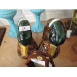 A pair of Italian ceramic Mallard duck ornaments