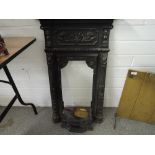 A small cast bedroom fire place