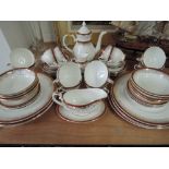 A part Royal Grafton Majestic dinner service in red and gilt, approx 59 pieces