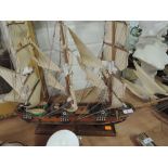 A model rigged sailing ship