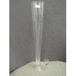 Three tall slender glass vases two 100cm tall and one 80cm