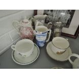 A selection of vintage tea pots novelty cup and saucers etc