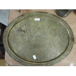 A vintage hand worked Indian style brass tray with tree and garden scene