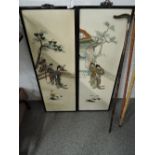 A pair of oriental possibly Chinese lacquered embossed panels with hand painted detailing measuring