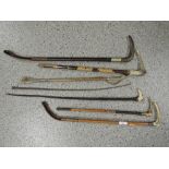 A selection of early 20th to 19th century riding crops with hickory, bamboo, and leather bound