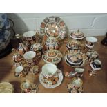 A selection of trinkets and ceramics in an Imari style with Lancashire rose in a Crown Derby style