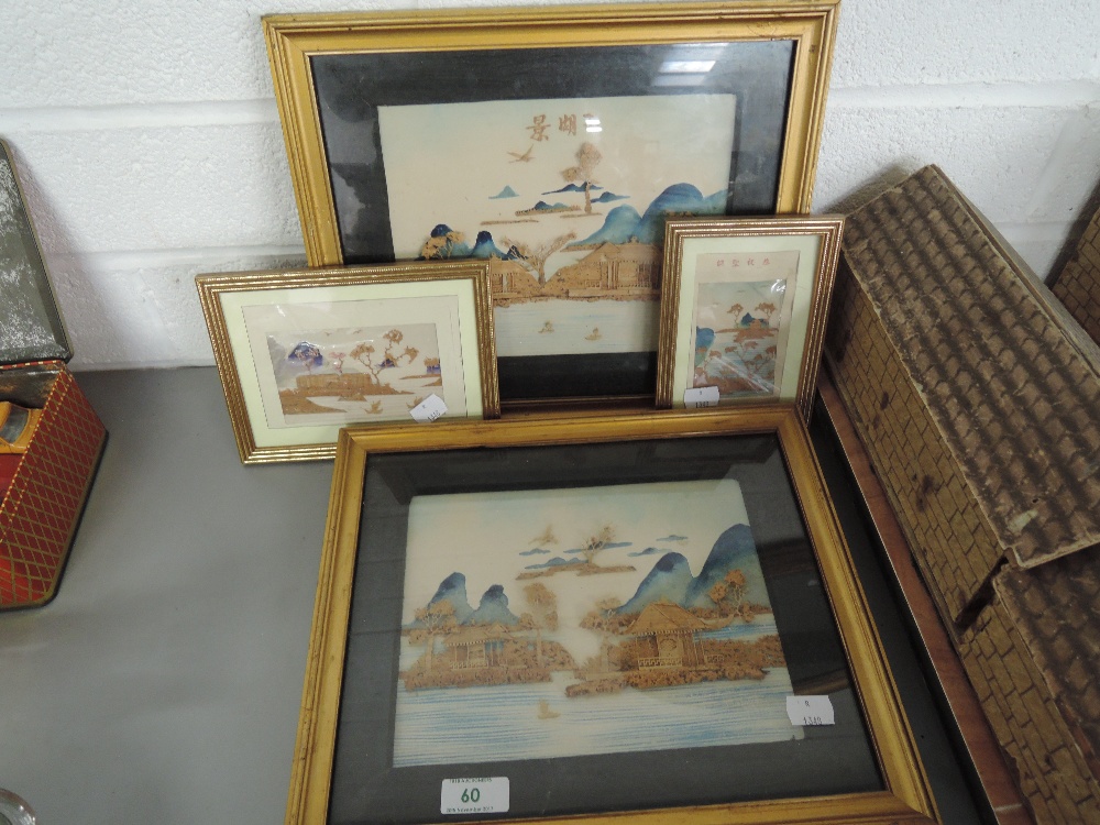 Two oriental framed scenes with watercolour and caulk relief