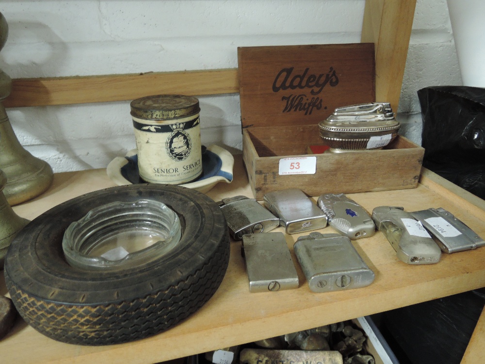 A selection of vintage smoking tobacco items including Ronson lighter Goodyear ashtray etc