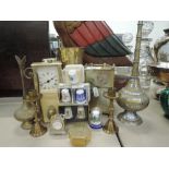 A selection of mantle display items including carriage style clock and miniature candle stick pair