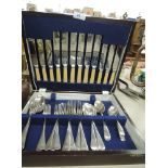 A boxed selection of flatware and cutlery by Redge
