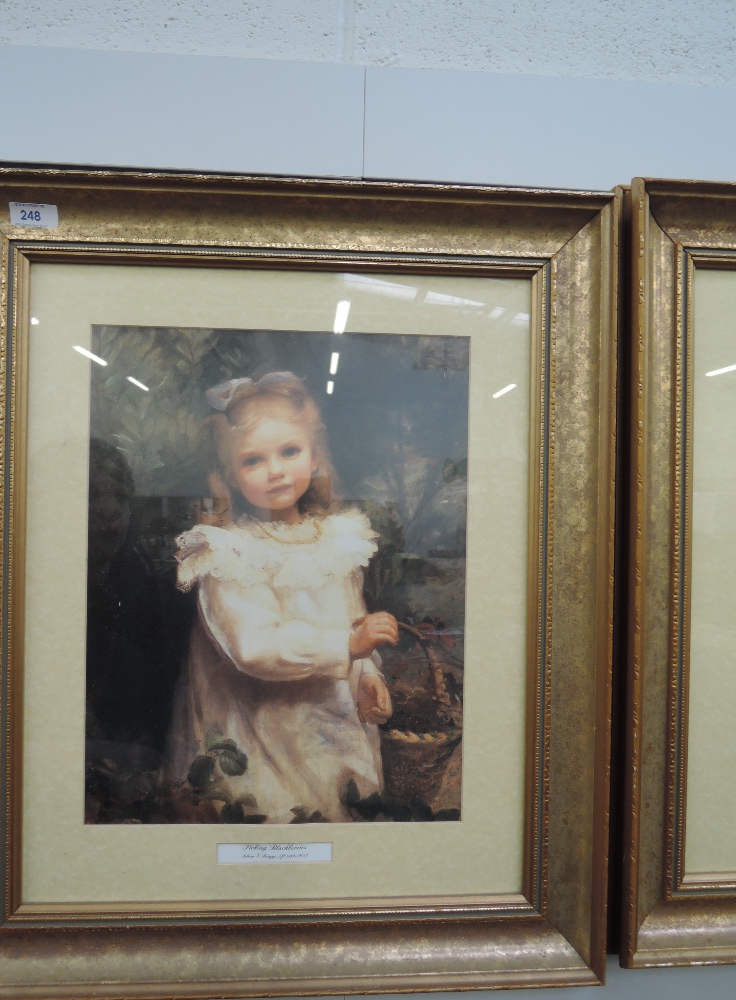 A pair of vintage style childrens portraits in plaster and gilt style frame