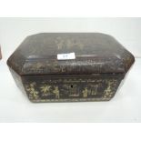 A 19th century lacquered box of canted design having Japanesque decoration