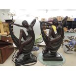 A pair of vintage style lamps as semi clad deco style dancers with frosted glass pane