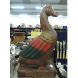 A life sized treen figure of a duck or similar