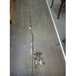 A selection of fishing and tackle related items including rods and reels