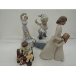 A selection of figurines and display figures including musical winter drummer boy