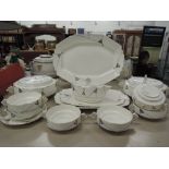 A part dinner service by James Kent in the Metropolis shape Art Deco style